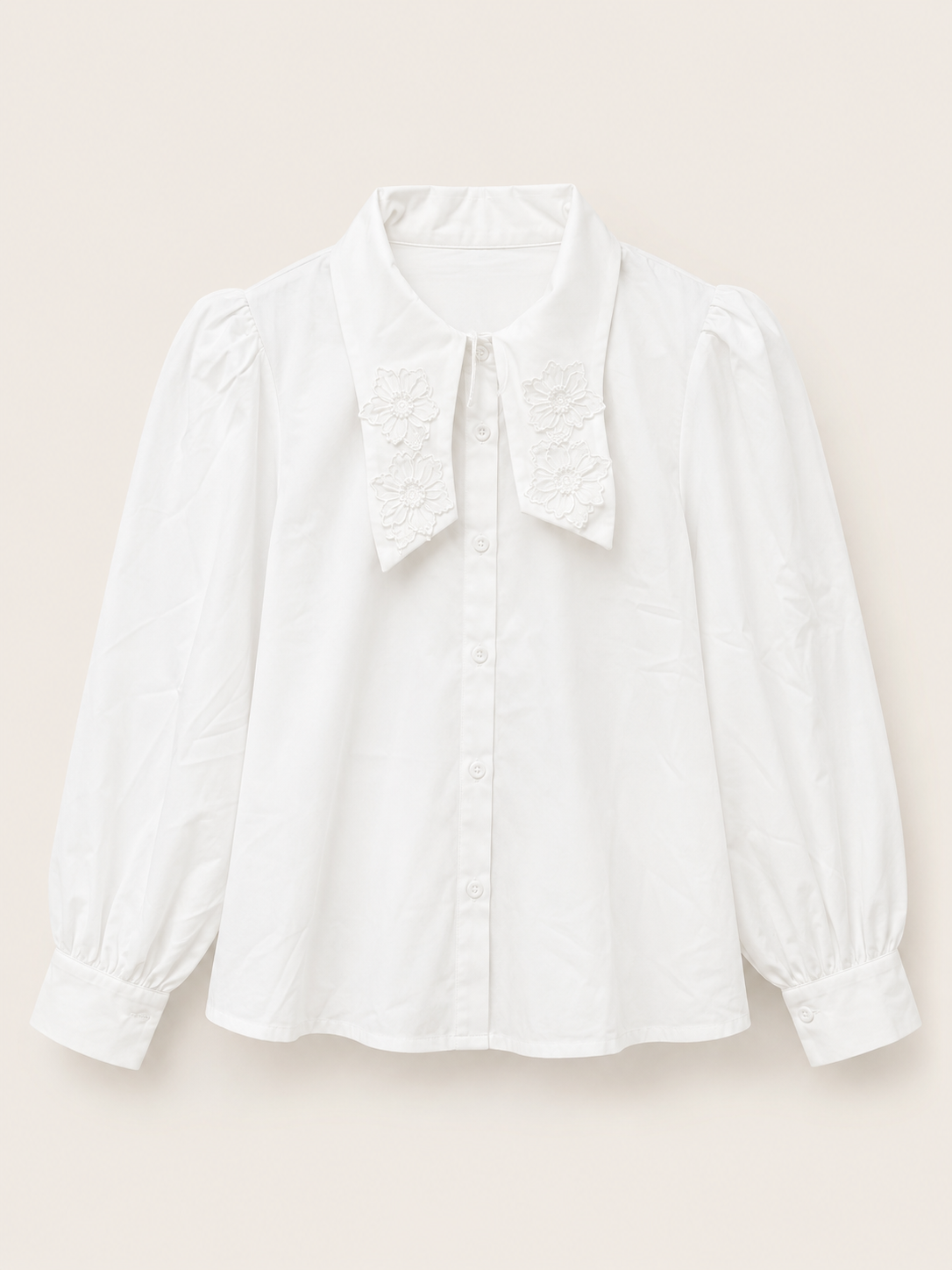 Blusa abullonada moño
